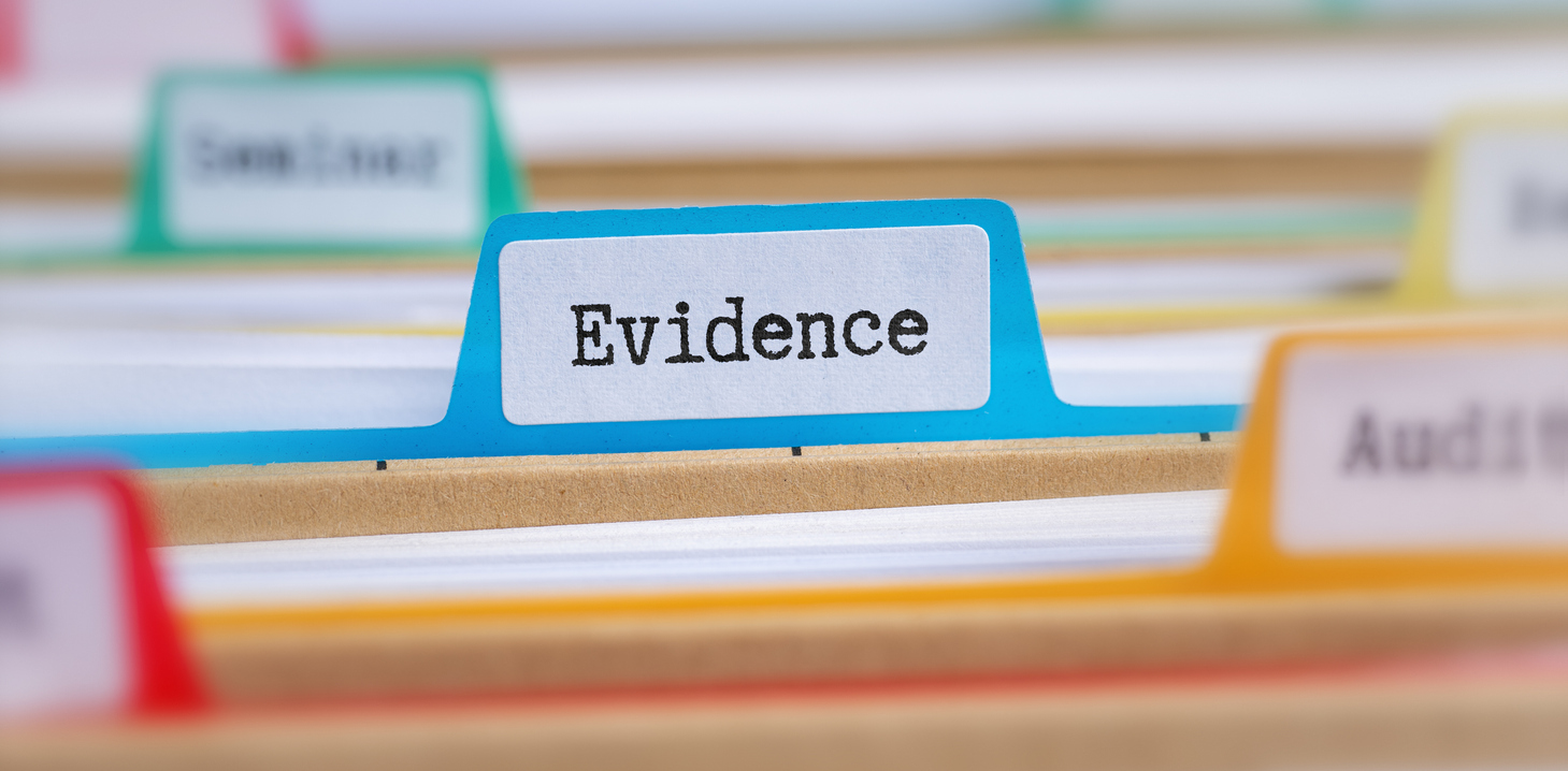 Close up of filing showing section labelled Evidence